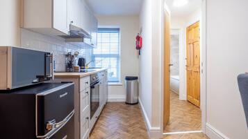 Llety Double with a sofa bed | Yksityinen keittiö | Kahvin-/teenkeitin, vedenkeitin