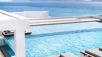 Outdoor pool, open 10:30 AM to 8:00 PM, pool umbrellas, sun loungers