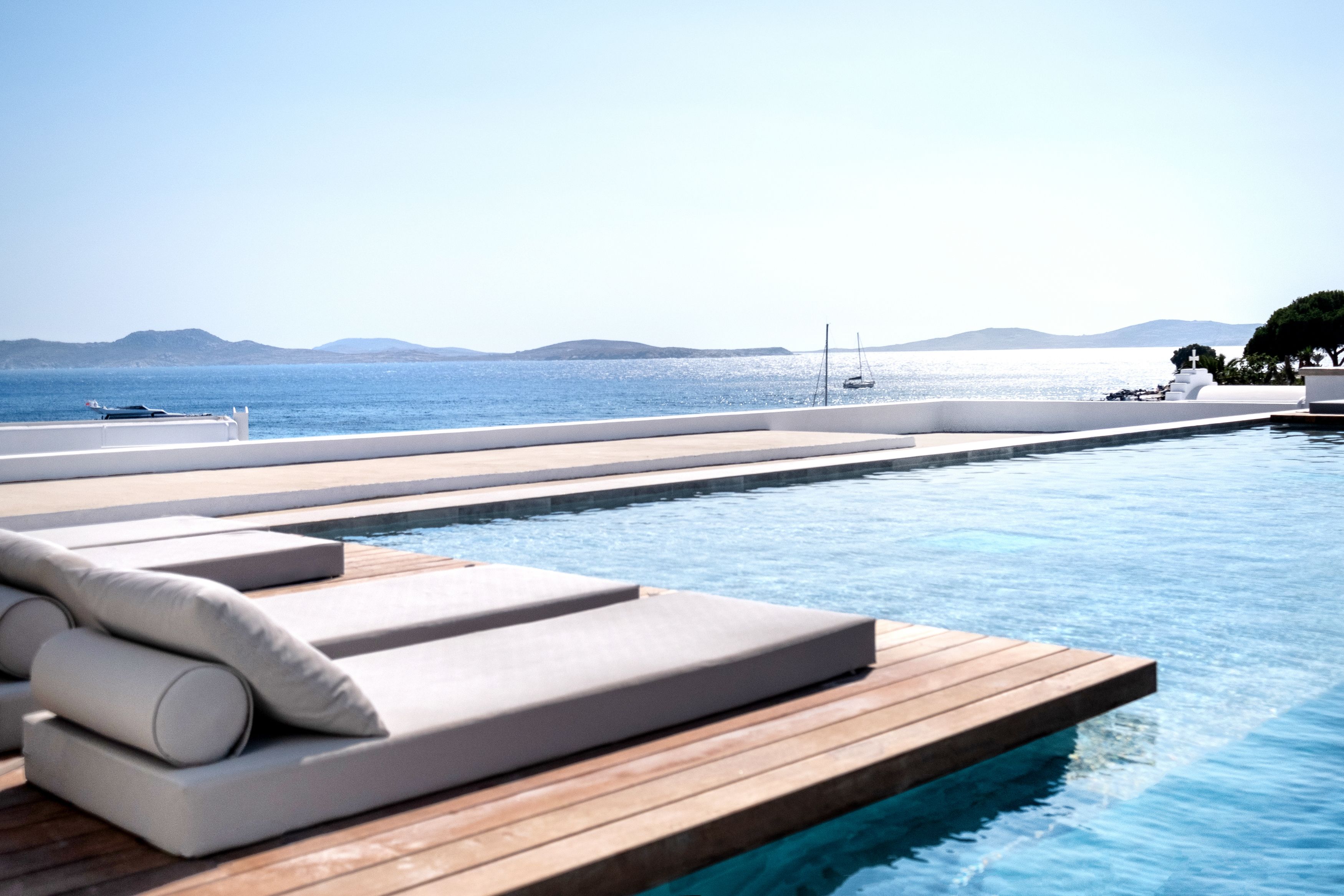 outdoor pool, open 10:30 am to 8:00 pm, pool umbrellas, pool loungers