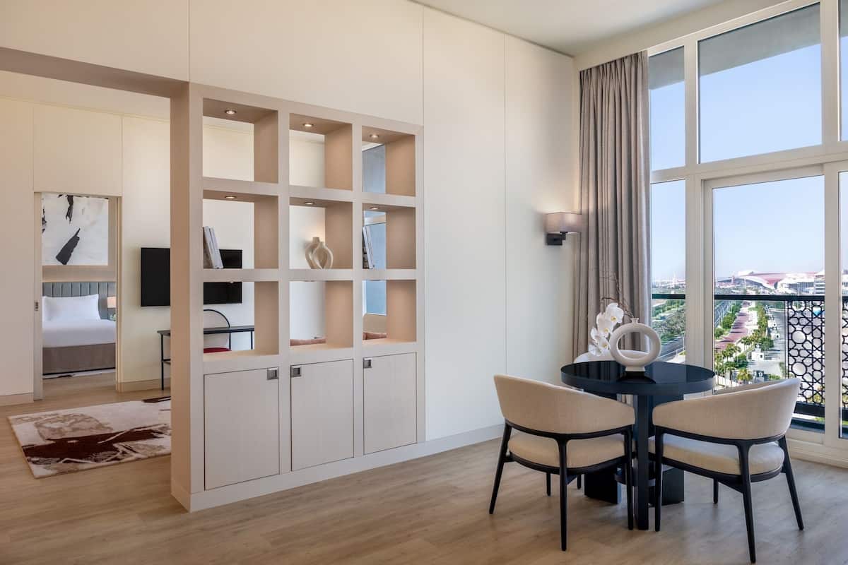 Suite, 2 Bedrooms, Balcony, Pool View | Down duvets, in-room safe, blackout curtains, soundproofing