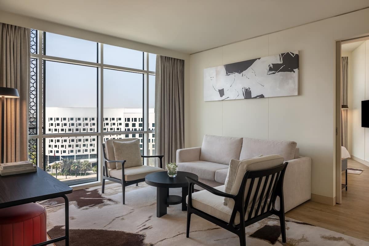 Suite, 2 Bedrooms (Plaza View) | Living area | 32-inch LCD TV with satellite channels, TV