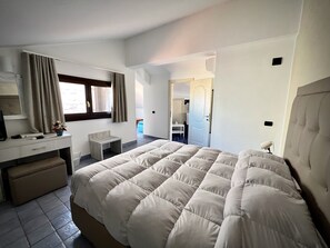 Standard Room, Terrace, Sea View | Minibar, in-room safe, desk, laptop workspace - Hotel Residence Capo Campolato (Augusta)