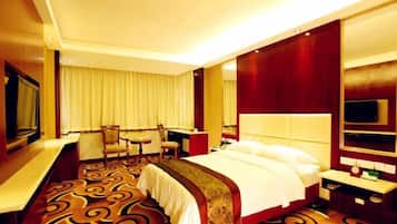 Down duvets, pillow-top beds, desk, blackout curtains