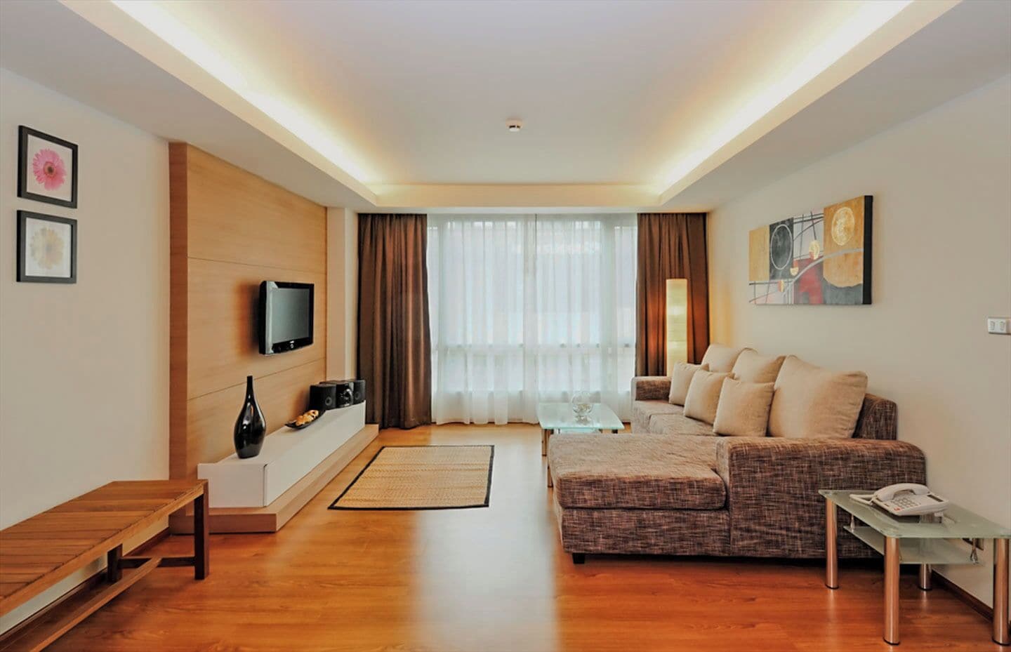 Suite, 1 Bedroom | Living area | 32-inch plasma TV with satellite channels, TV, DVD player