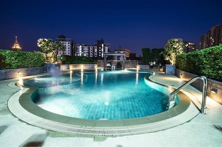 Outdoor pool, pool loungers. Olive Hotel & Residence Bangkok Sukhumvit 101 near True Digital Park
