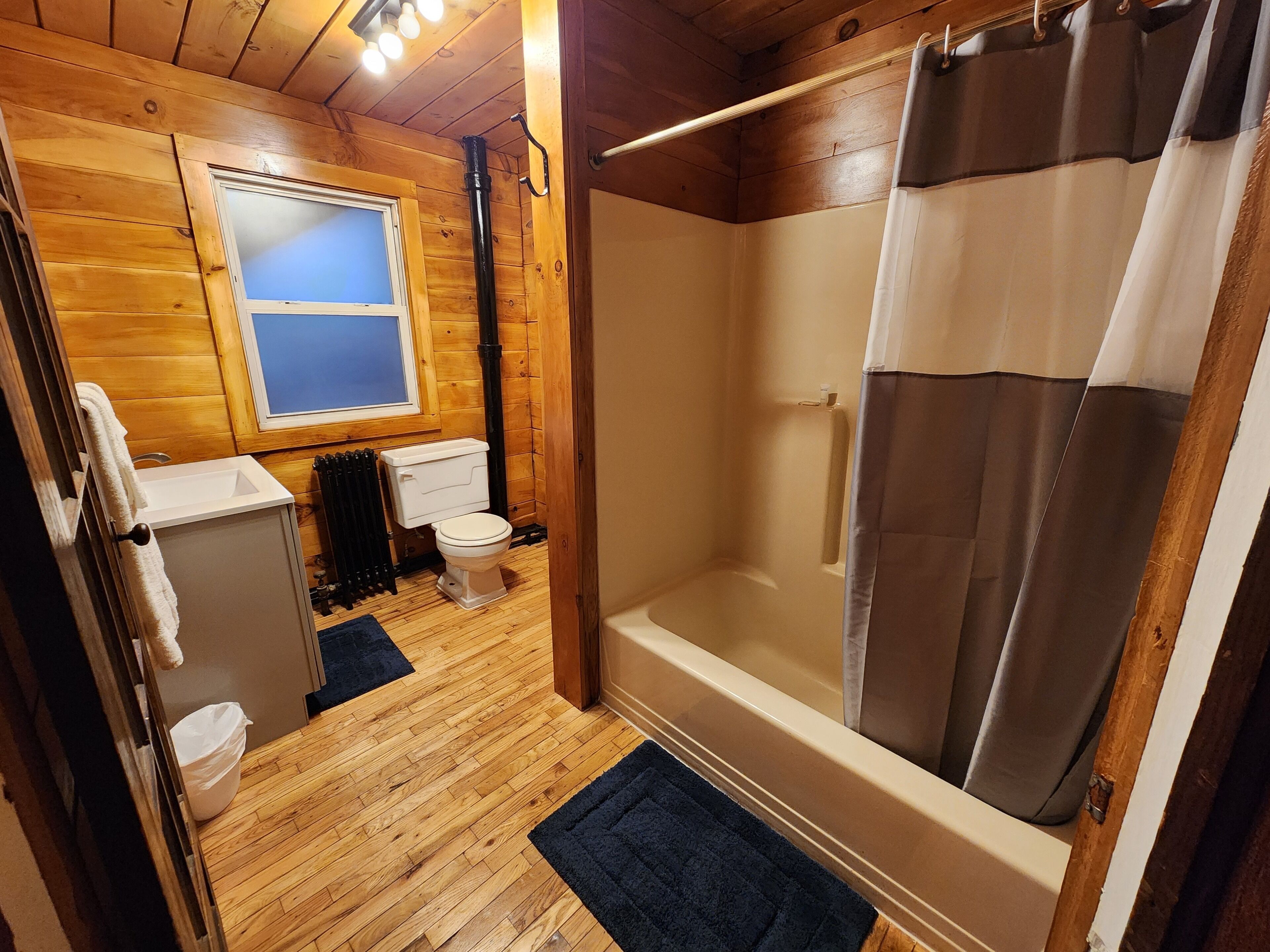 Standard Room (One Queen and One Single Bed) | Bathroom | Combined shower/tub, hair dryer, towels, soap