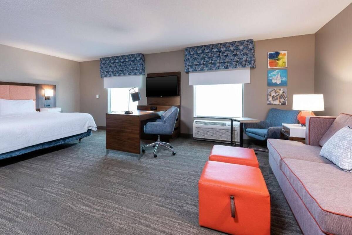 Blackout drapes, iron/ironing board, WiFi (free), alarm clocks