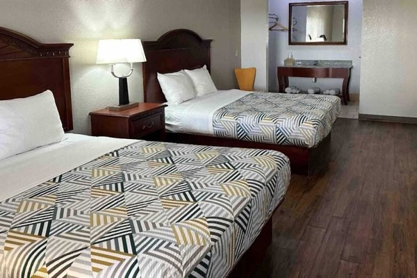 Desk, blackout drapes, WiFi (free), bed sheets