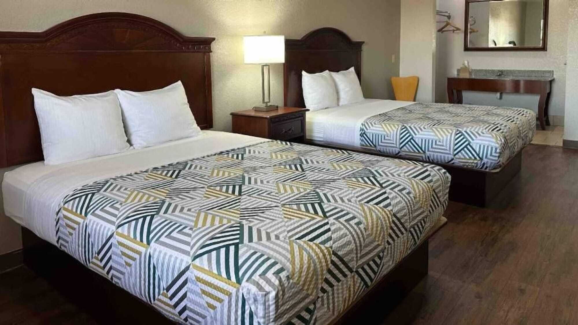 Desk, blackout curtains, free WiFi, bed sheets