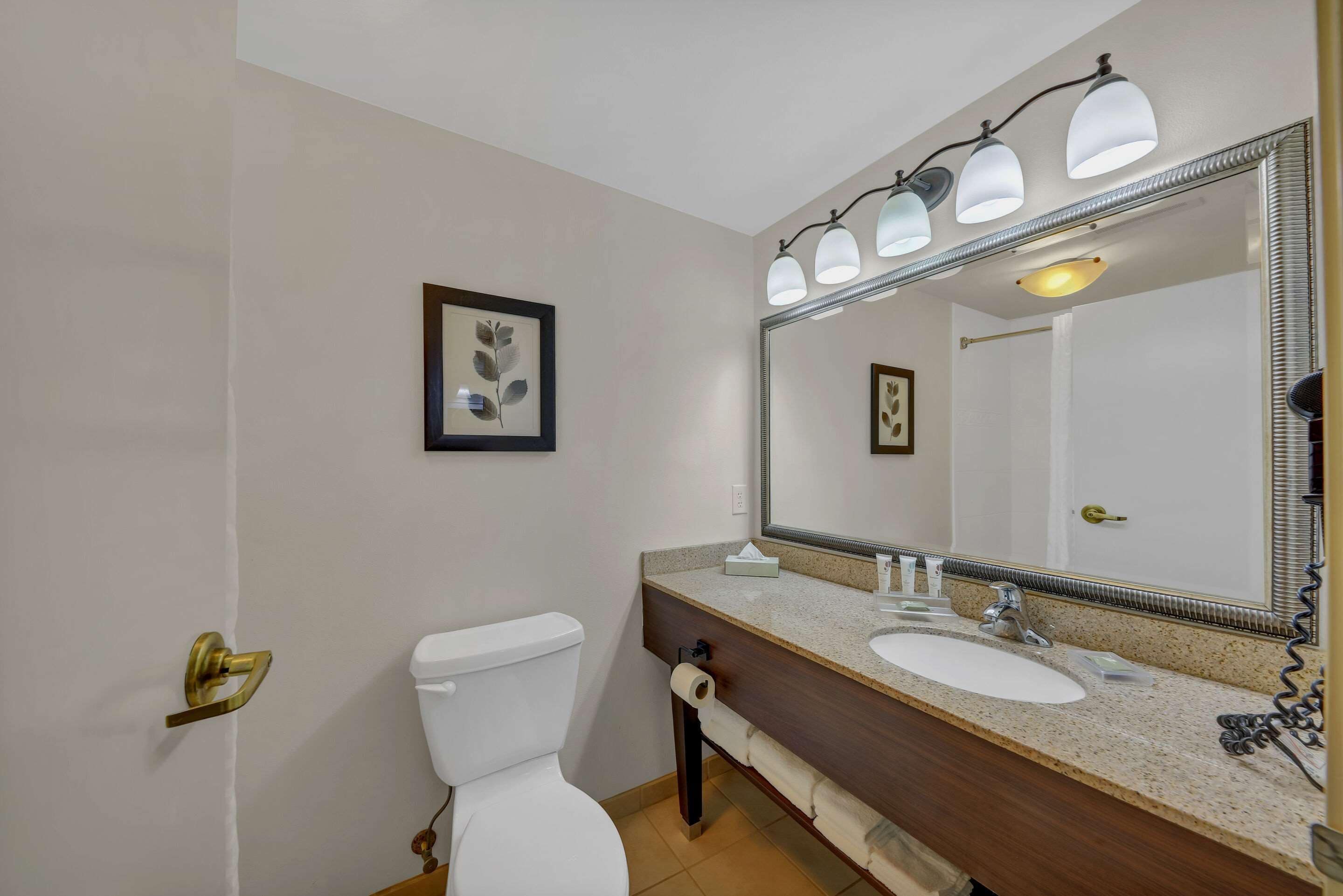 desk, laptop workspace, blackout curtains, iron/ironing board