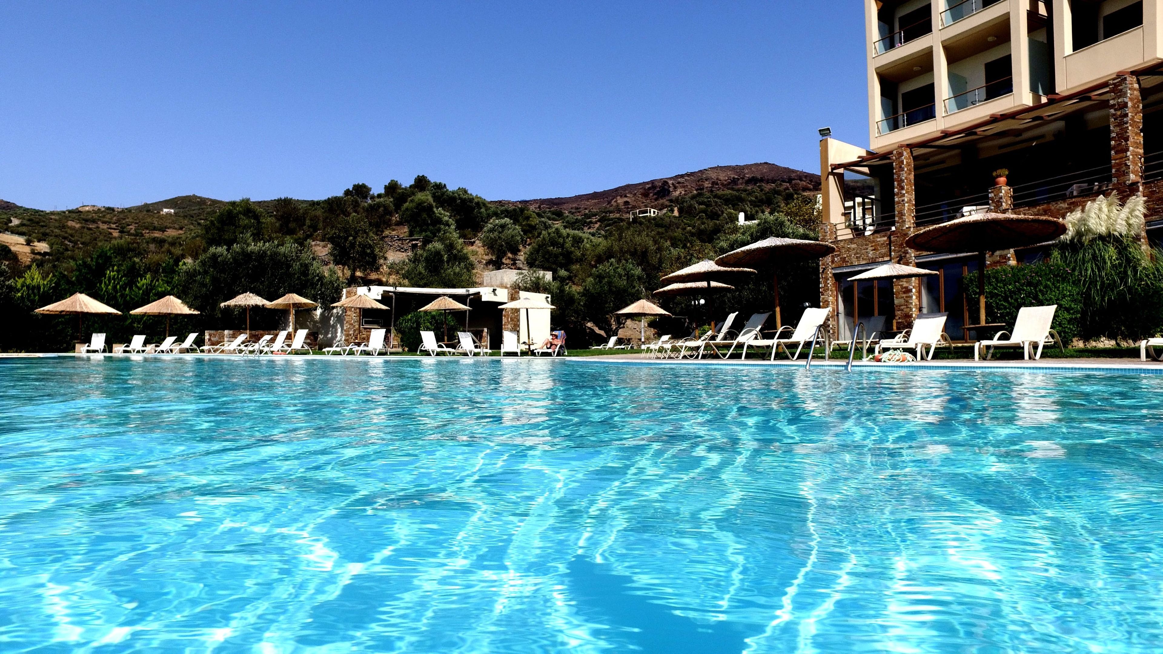 seasonal outdoor pool, open 10:00 am to 8:00 pm, pool umbrellas