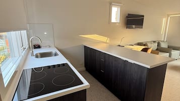 Studio | Private kitchen | Fridge, microwave, stovetop, electric kettle