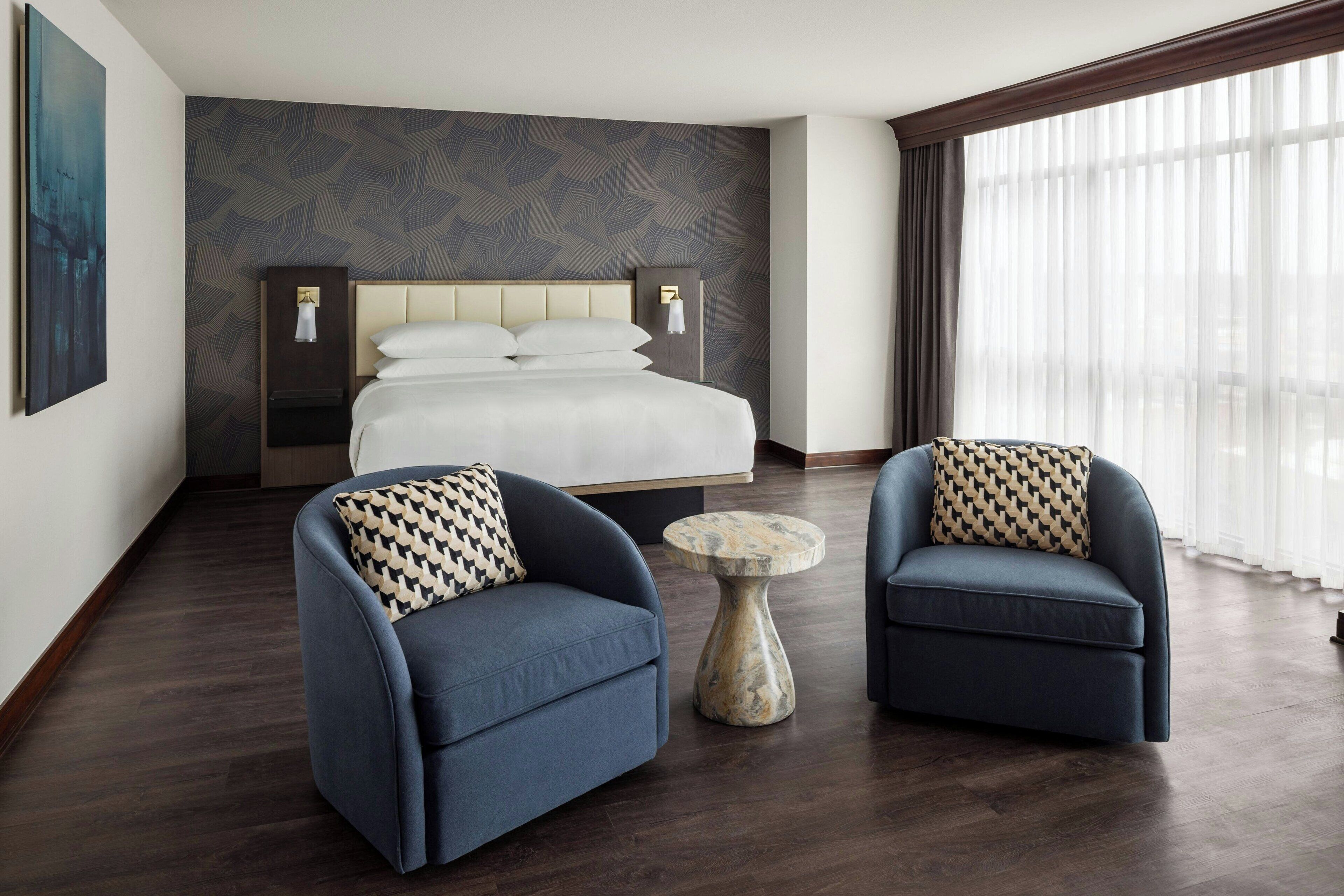 premium bedding, down duvets, pillow-top beds, in-room safe