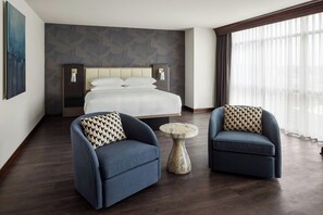 Premium bedding, down duvets, pillow-top beds, in-room safe