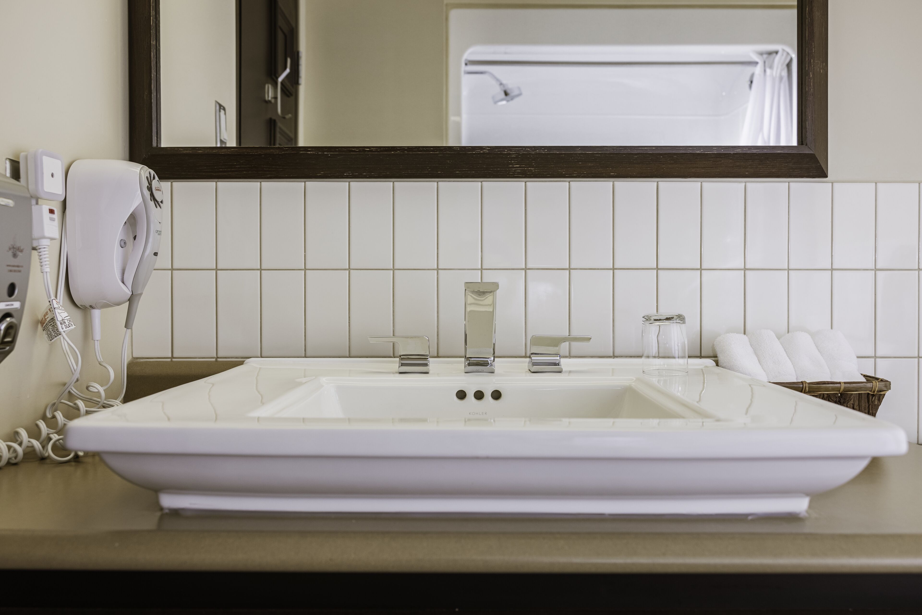 comfort room 2 queen beds at the caribou pavilion  | bathroom | hair dryer, towels, soap, shampoo