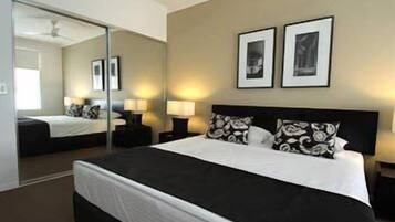 Pillow-top beds, desk, blackout curtains, soundproofing