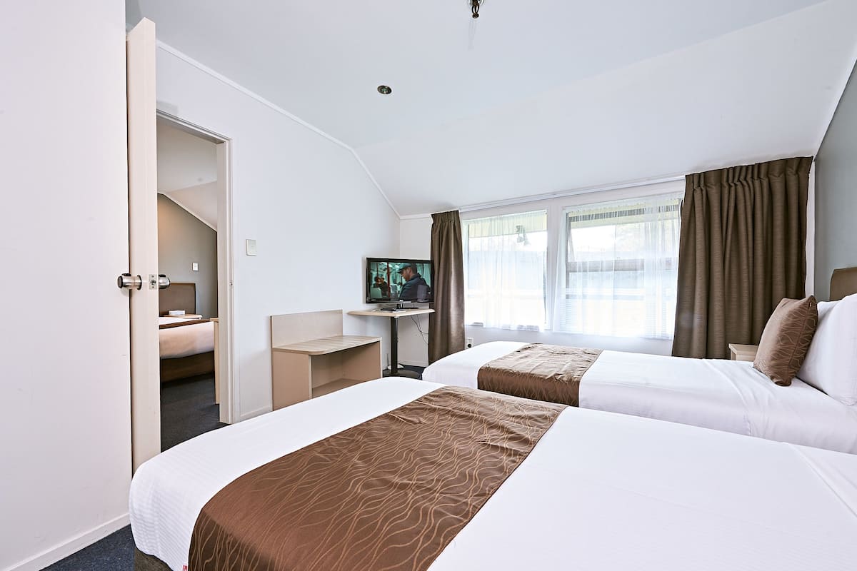 family suite | in-room safe, desk, laptop workspace, blackout curtains