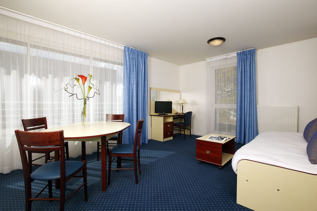 Superior Apartment, 1 Bedroom | Living area | Flat-screen TV