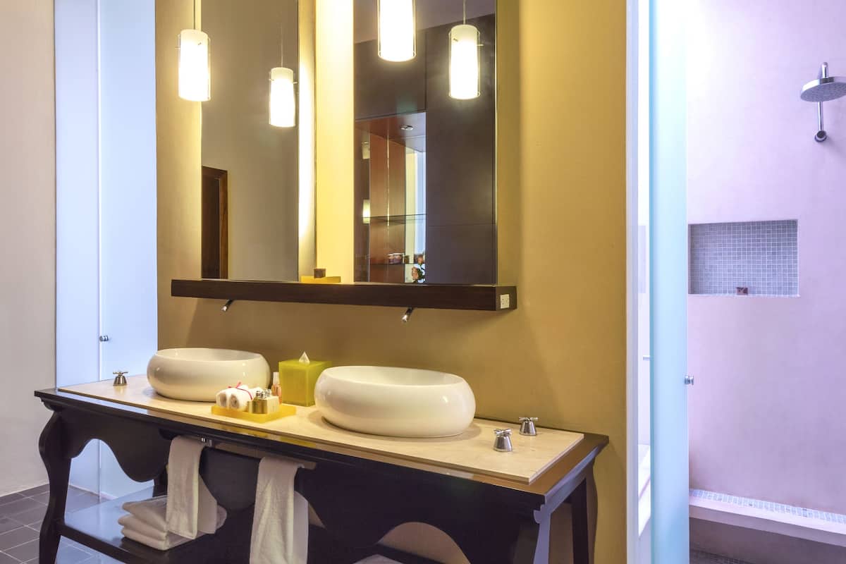 deluxe room (2 double beds) | bathroom amenities | separate bathtub and shower, deep-soaking bathtub, rainfall showerhead