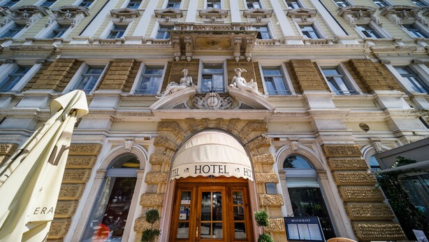 A hotel facade with a classic architectural style, featuring ornate details and a prominent entrance. - Hotel Continental (Rijeka)