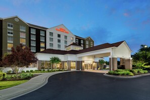 A multi-story hotel with a prominent entrance and a sign reading 'Hilton Garden Inn'. - Hilton Garden Inn Greenville (Greenville)