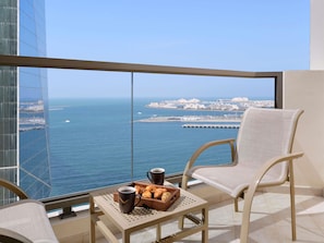 Family Suite, 1 King Bed, Balcony, Partial Sea View | Minibar, in-room safe, desk, laptop workspace
