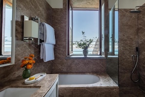 Select Comfort beds, minibar, in-room safe, desk