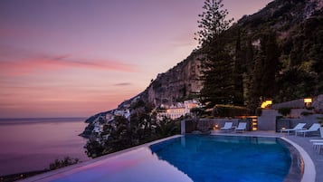 Seasonal outdoor pool, pool umbrellas, sun loungers