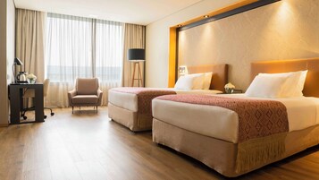 Ropa de cama de alta calidad y minibar 