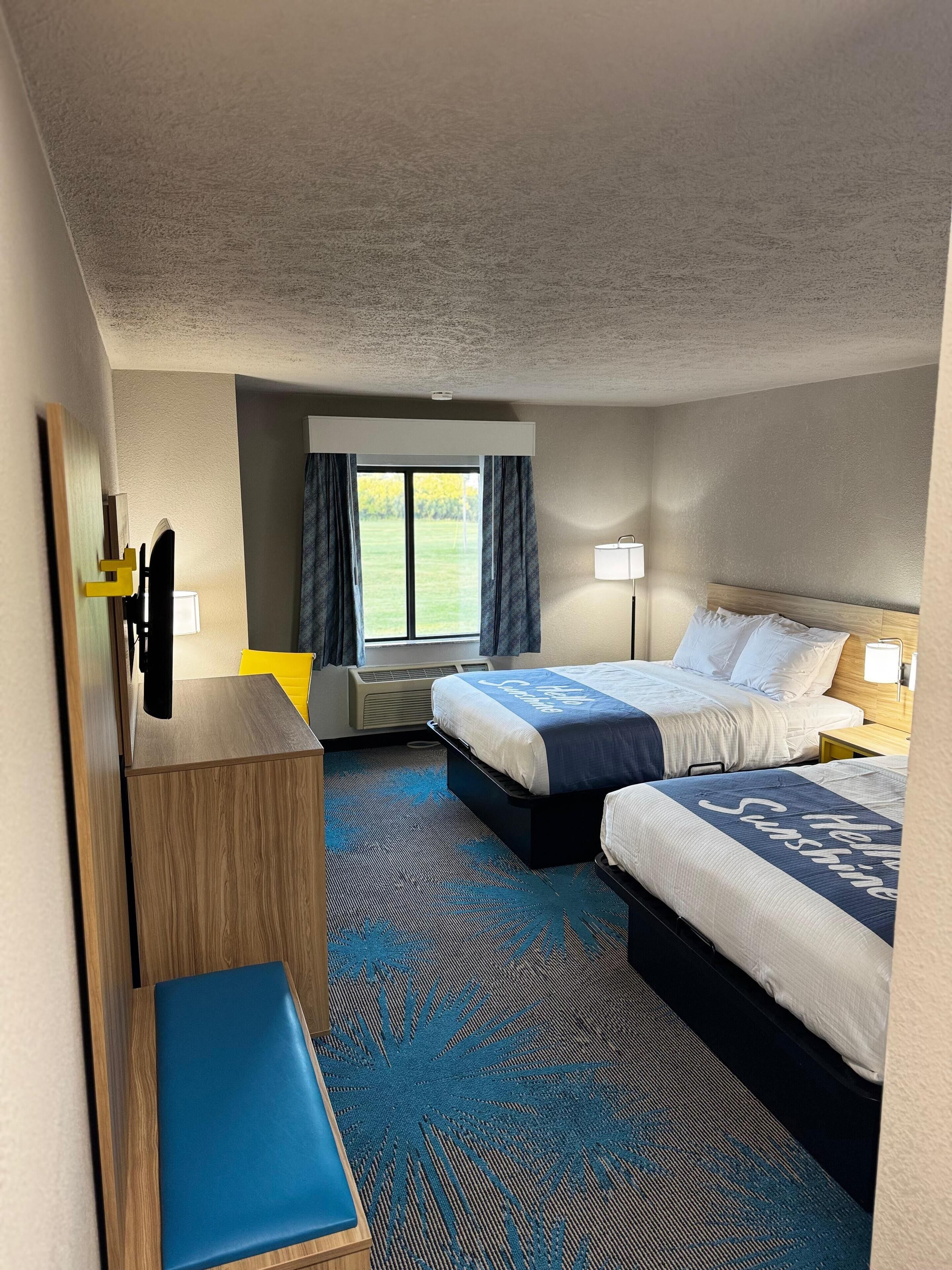 Room, 2 Queen Beds, Non Smoking, Refrigerator & Microwave | In-room safe, desk, laptop workspace, blackout drapes