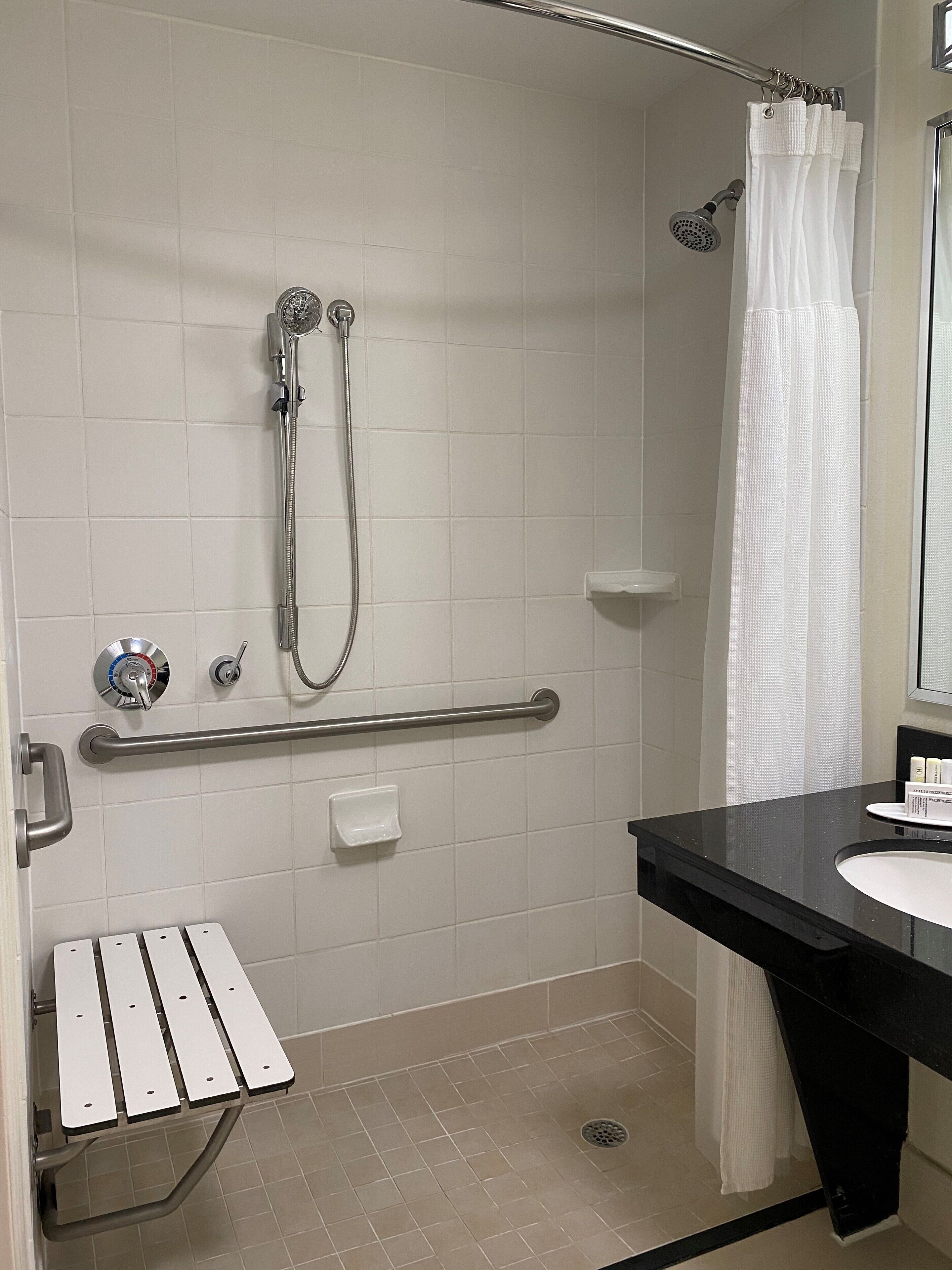 individually decorated, desk, laptop workspace, blackout curtains