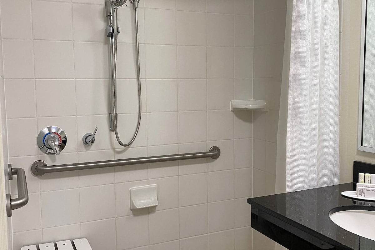 individually decorated, desk, laptop workspace, blackout curtains