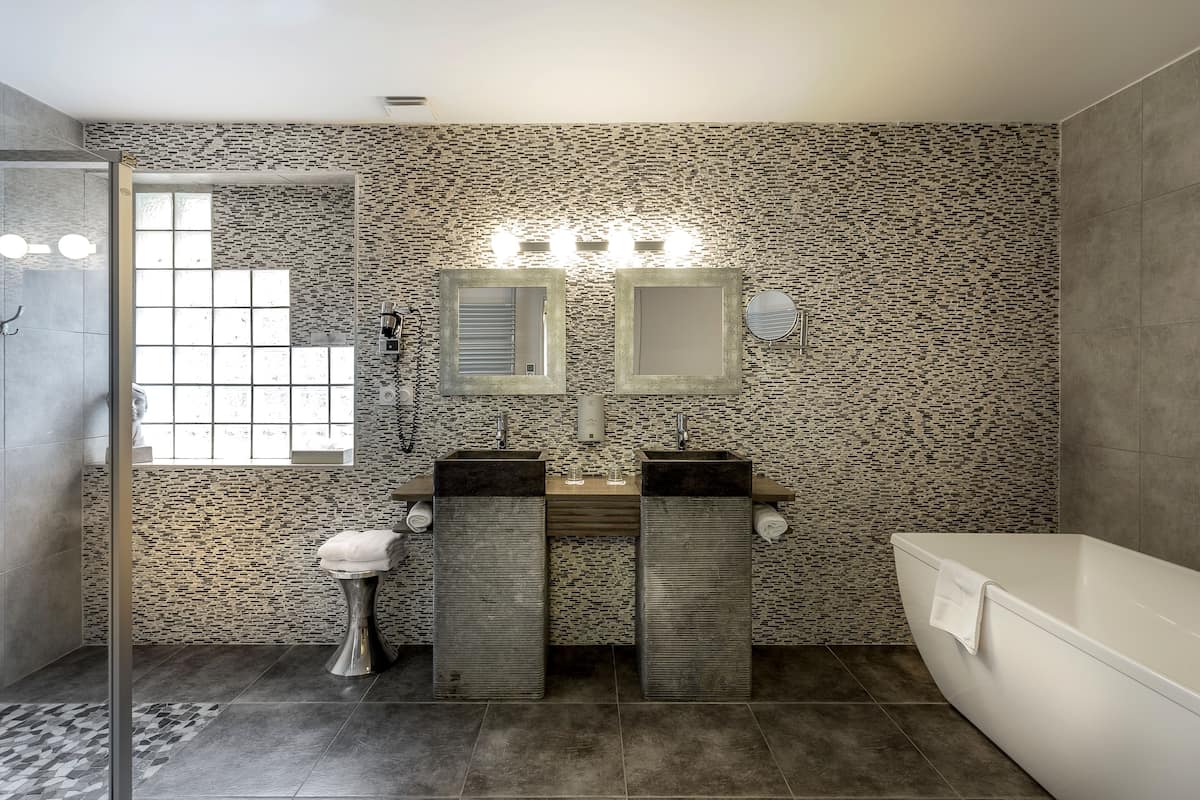 suite (2 person) | bathroom | hair dryer, towels