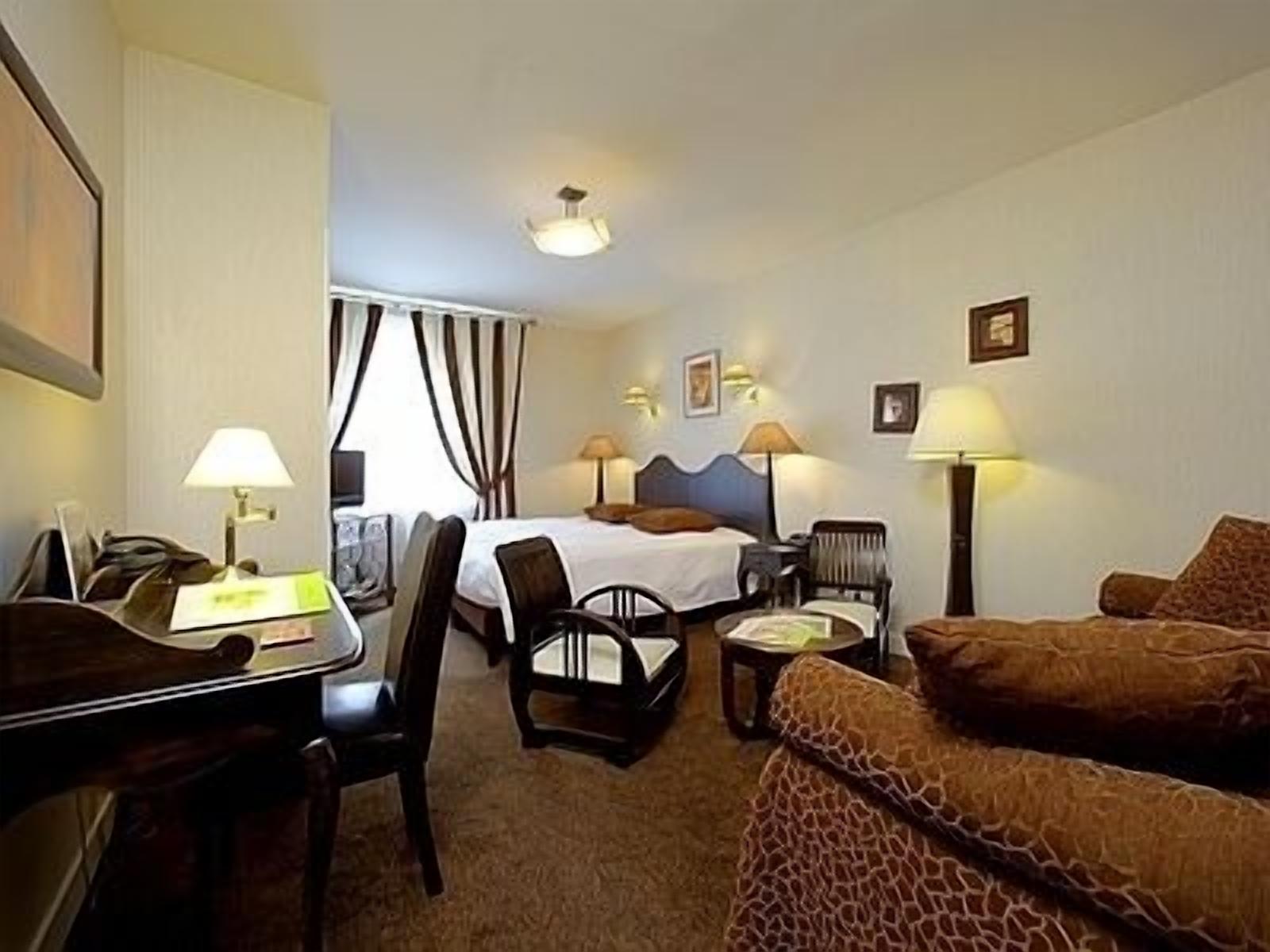 suite (2 person) | living area | flat-screen tv
