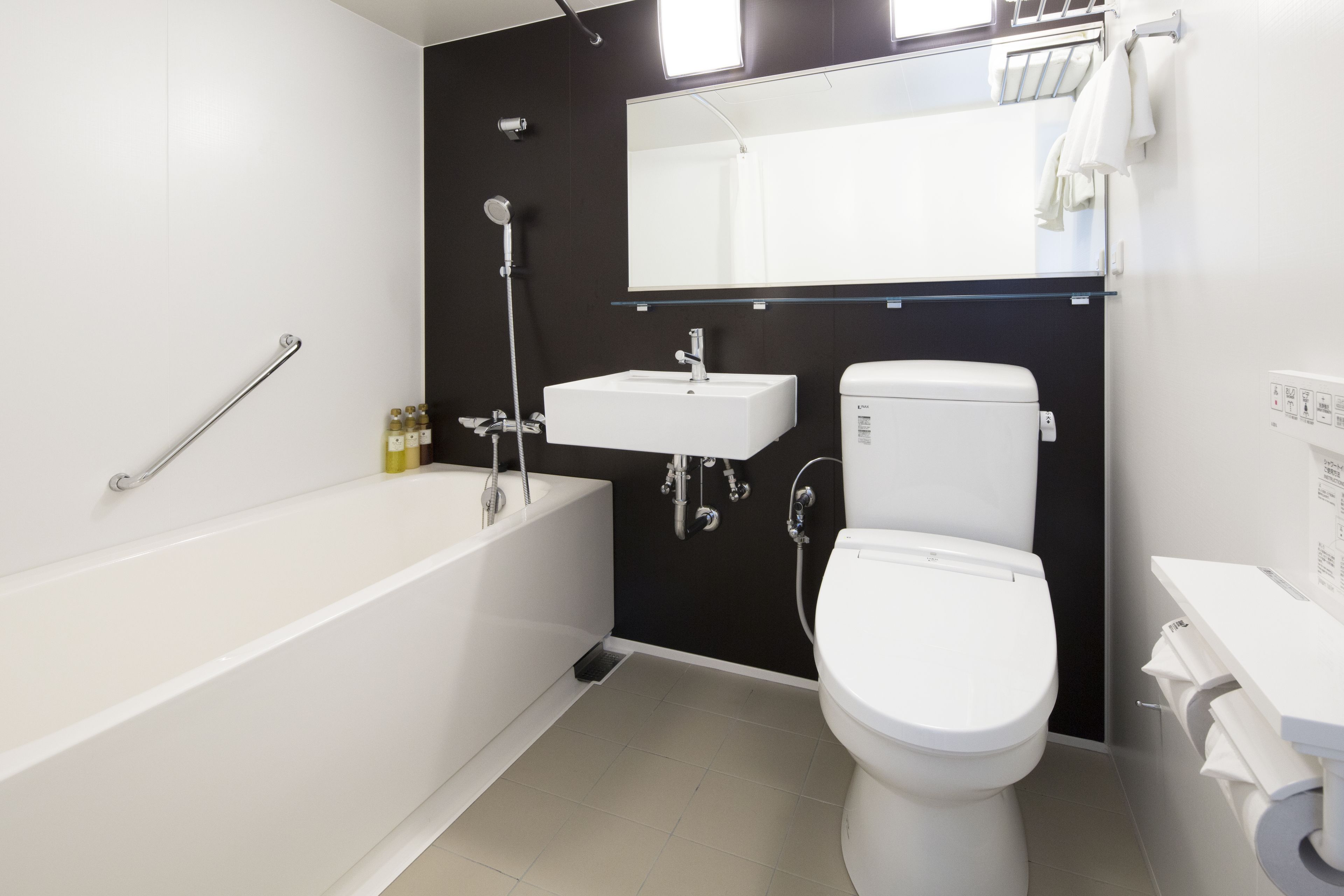 combined shower/bathtub, free toiletries, hair dryer, dressing gowns