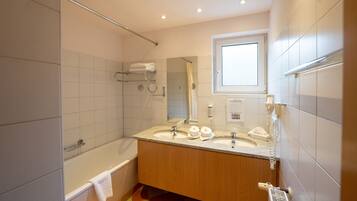 Eco-friendly toiletries, hair dryer, towels, soap