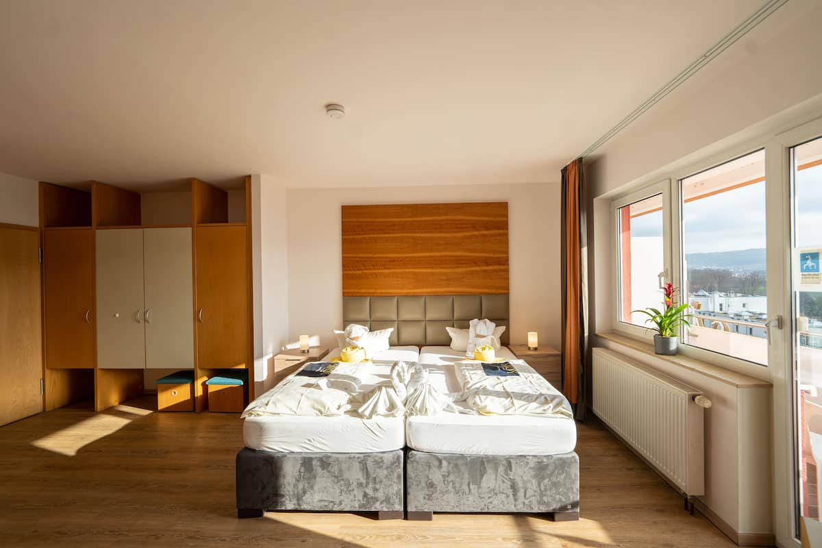 Premium bedding, desk, blackout curtains