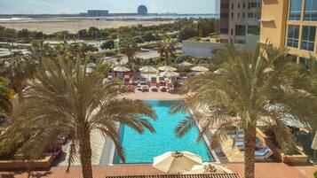 Outdoor pool, pool umbrellas, pool loungers