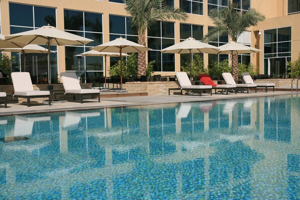 Outdoor pool, pool umbrellas, pool loungers