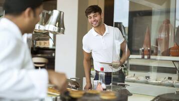 Daily buffet breakfast (AED 65 per person)