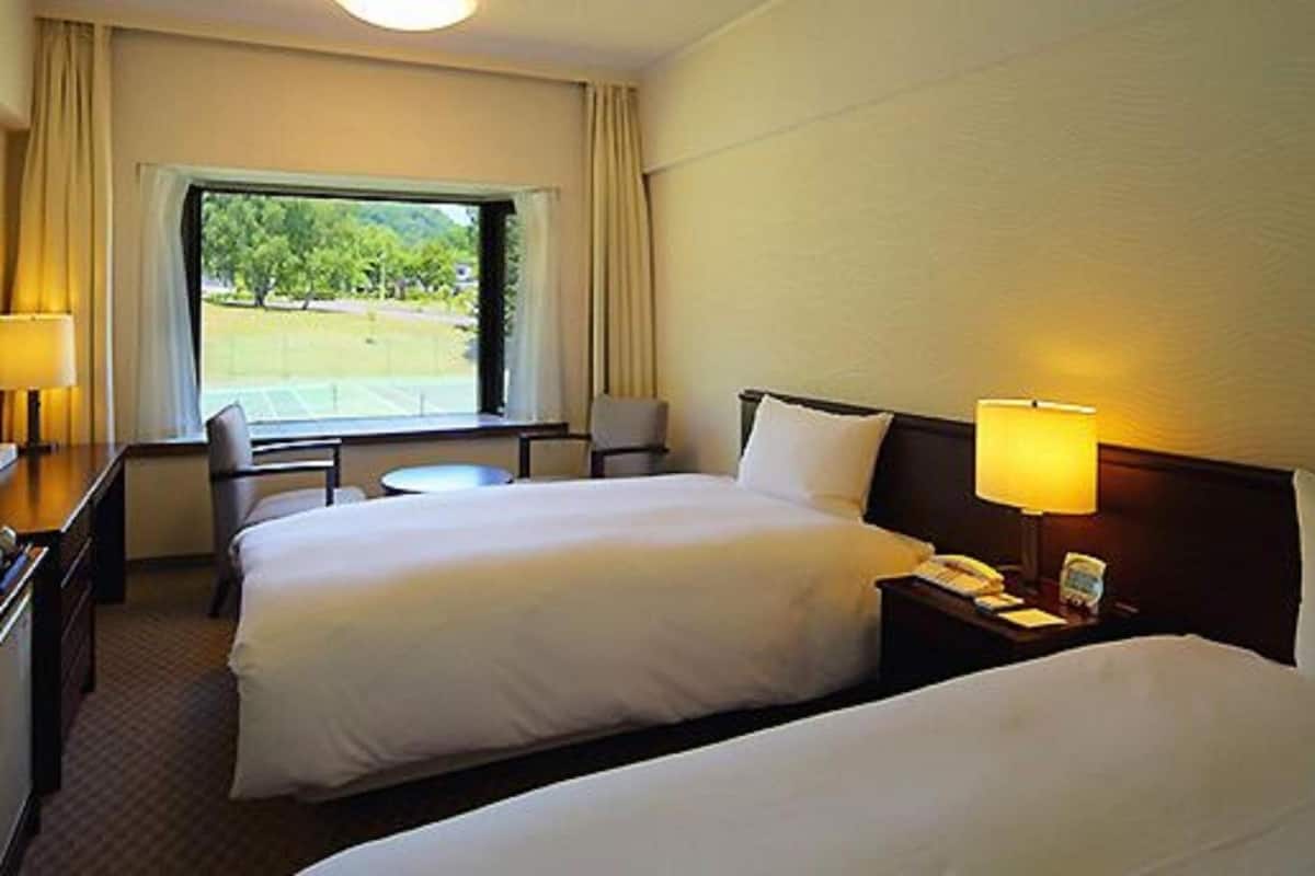 Tvåbäddsrum (C,2 single beds + 1 extra bed) | Värdeförvaringsskåp på rummet, gratis wi-fi och sängkläder