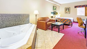 Suite, 1 cama de matrimonio grande, no fumadores, bañera de hidromasaje | Escritorio, espacio para trabajar con un portátil, cortinas opacas