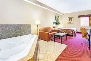 Suite, 1 King Bed, Non Smoking, Hot Tub | Desk, laptop workspace, blackout drapes, iron/ironing board