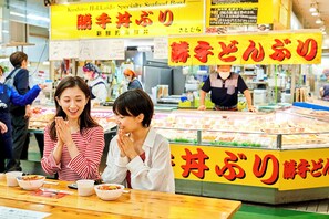 A seafood market with a display of various seafood items. - Kushiro Prince Hotel (Kushiro)