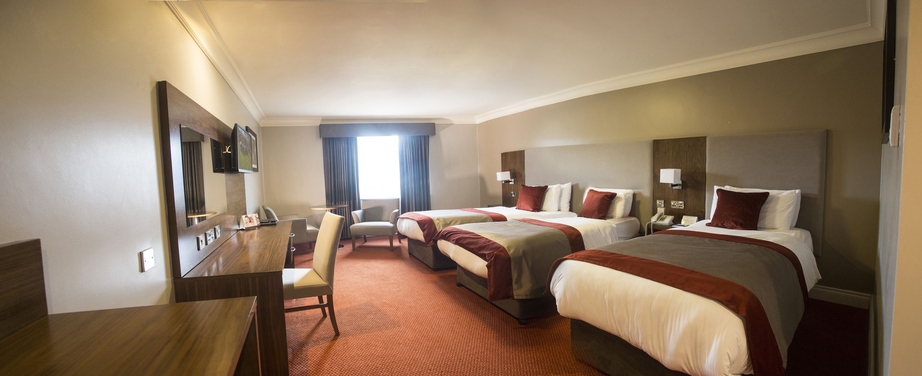 deluxe triple room | in-room safe, desk, soundproofing, iron/ironing board