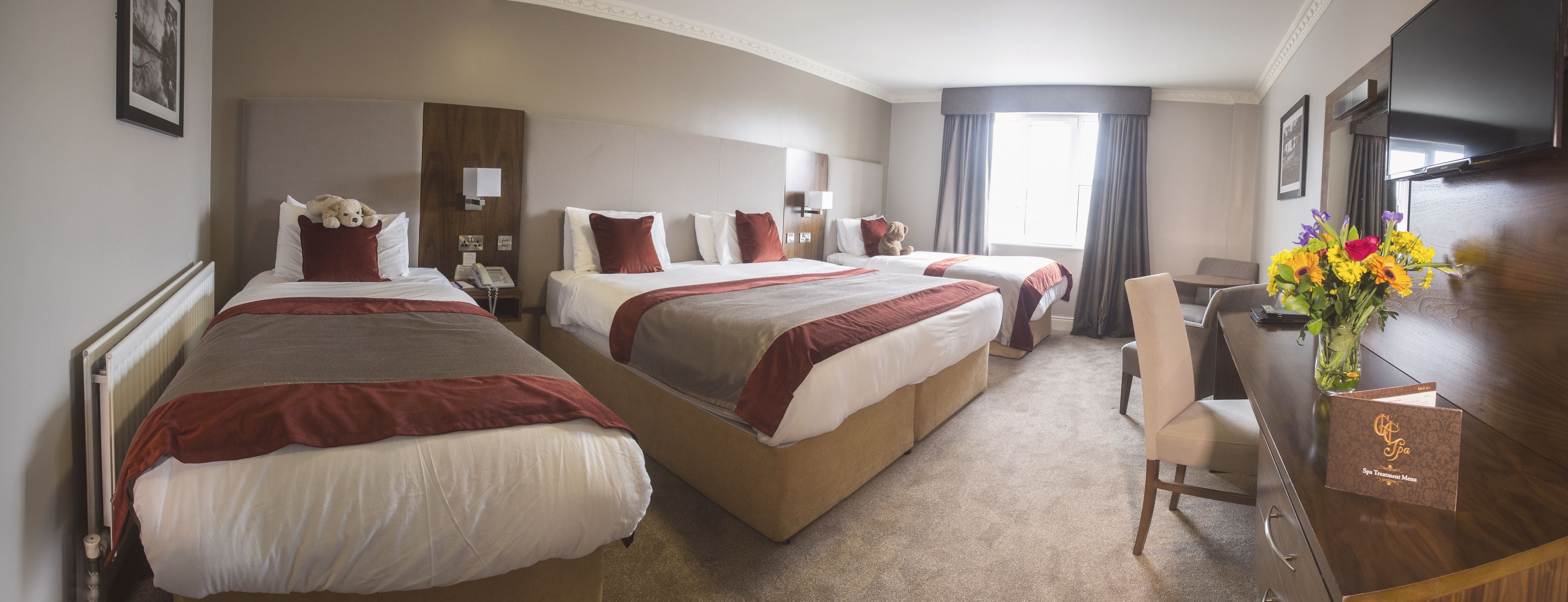 deluxe family room | in-room safe, desk, soundproofing, iron/ironing board