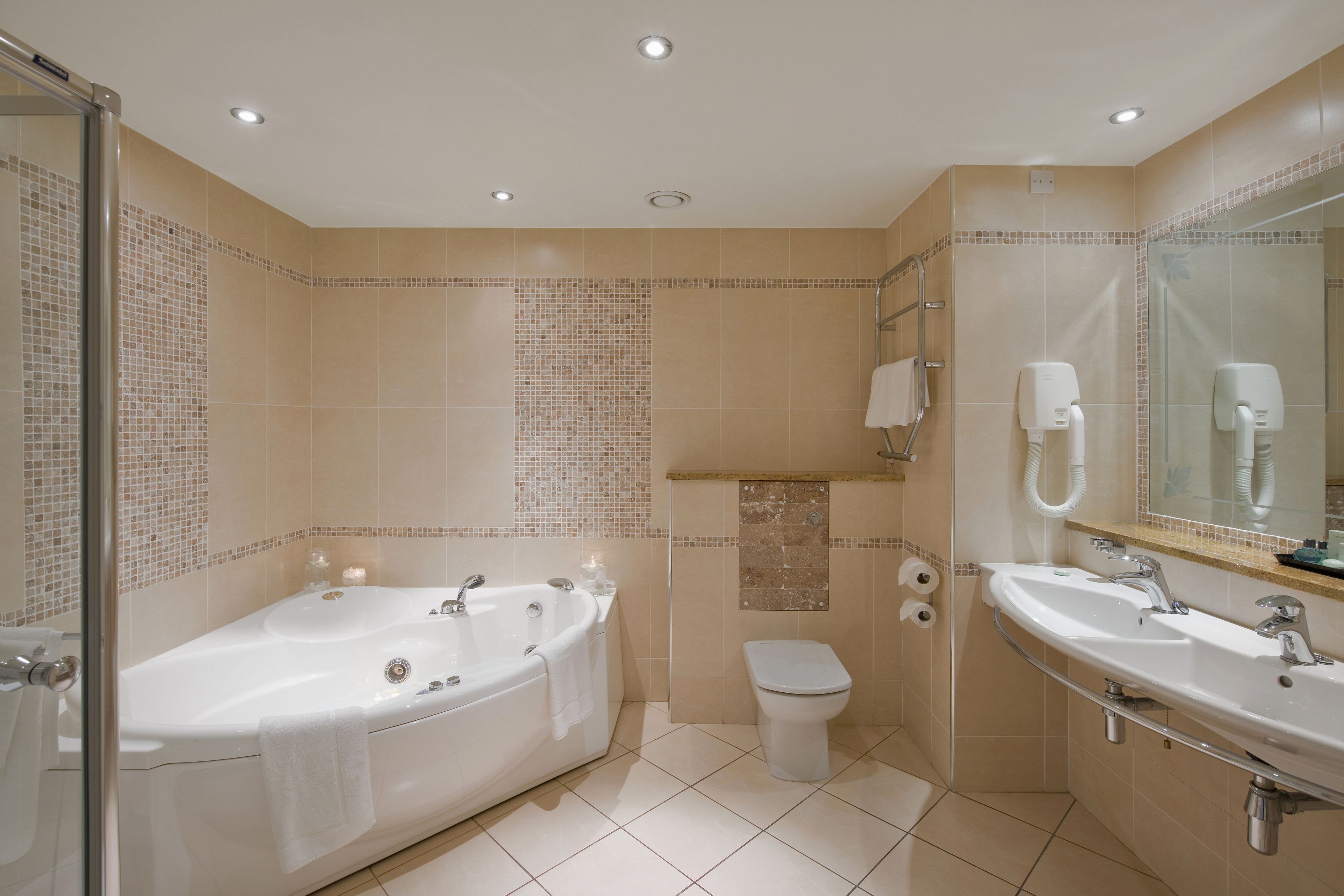 superior suite | bathroom | shower, free toiletries, towels