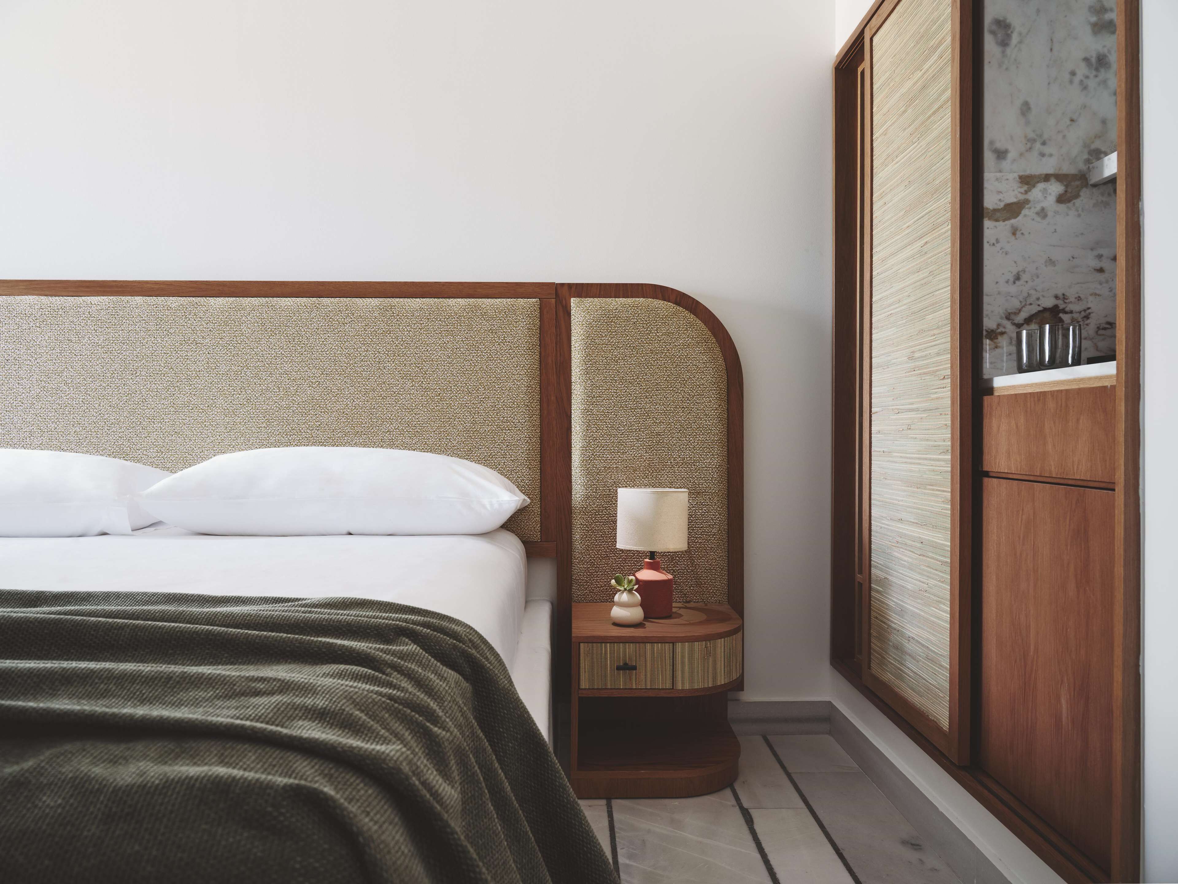 evergreen retreat side sea view with outdoor living area | hypo-allergenic bedding, minibar, in-room safe, individually decorated