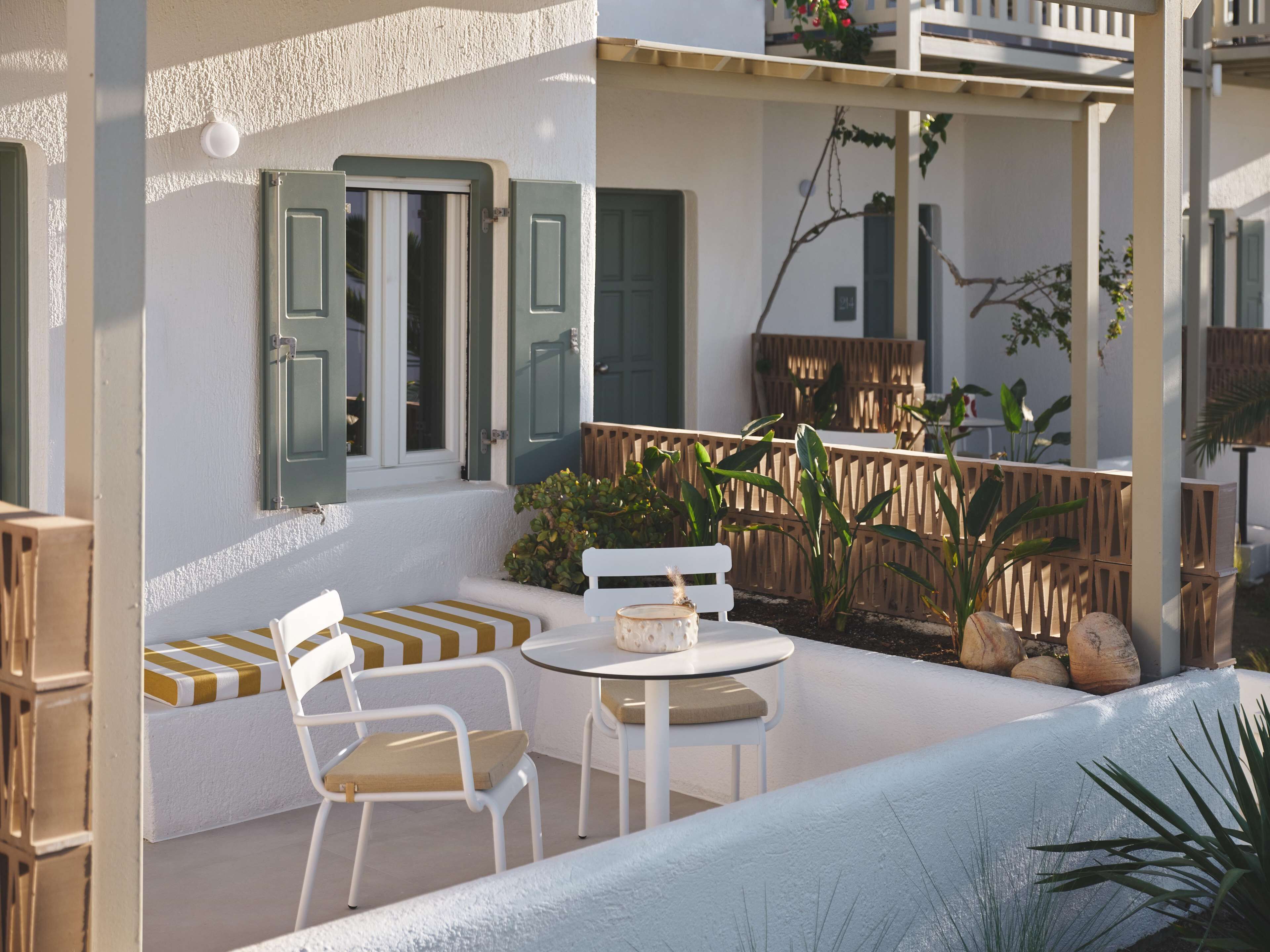 evergreen retreat garden view with outdoor living area | hypo-allergenic bedding, minibar, in-room safe, individually decorated