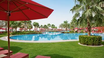 Outdoor pool, open 7:00 AM to 8:00 PM, pool umbrellas, pool loungers